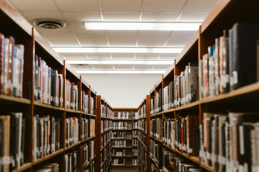 A long library aisle lined with bookshelves